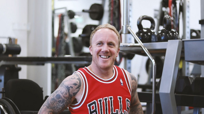 Corey Peters exercises at a gym