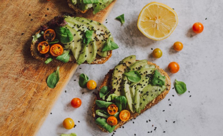 Image of avocado on toast with cherry tomato