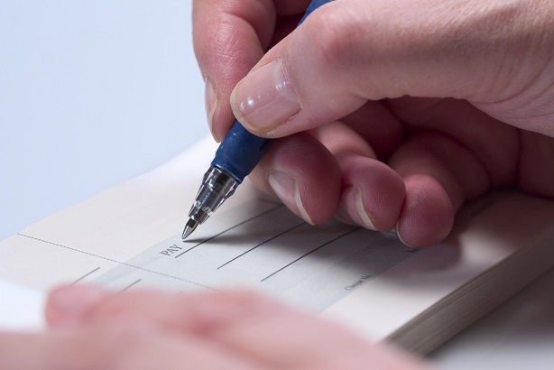 Person signing a cheque