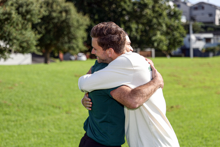 Josh and Kareem embrace