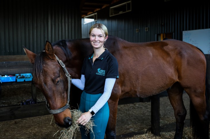 Lenka's daughter, Paris poses with her horse