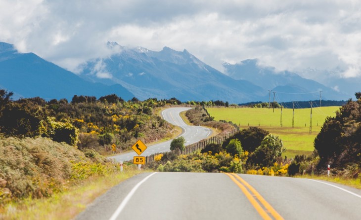 New Zealand state highway winds through the hills