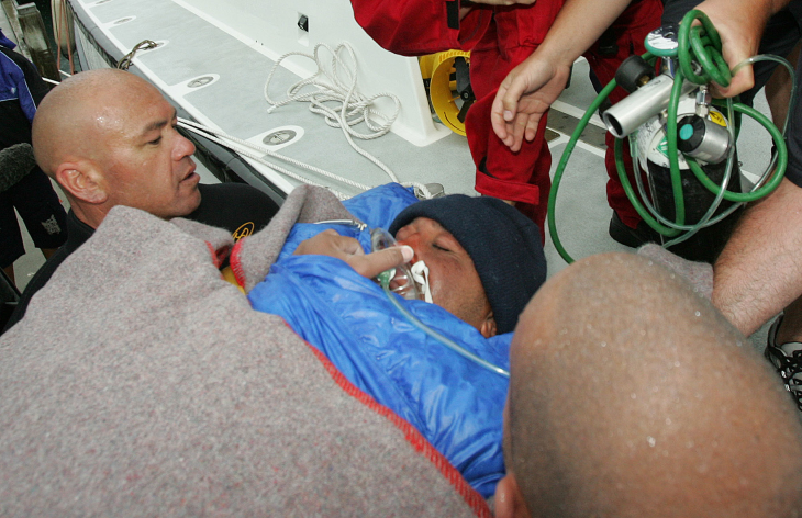 Rob Hewitt after his rescue in the Navy boat