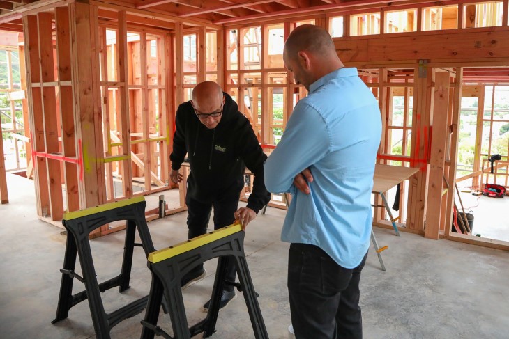 Chris shows James Whitaker how to set up some safety equipment
