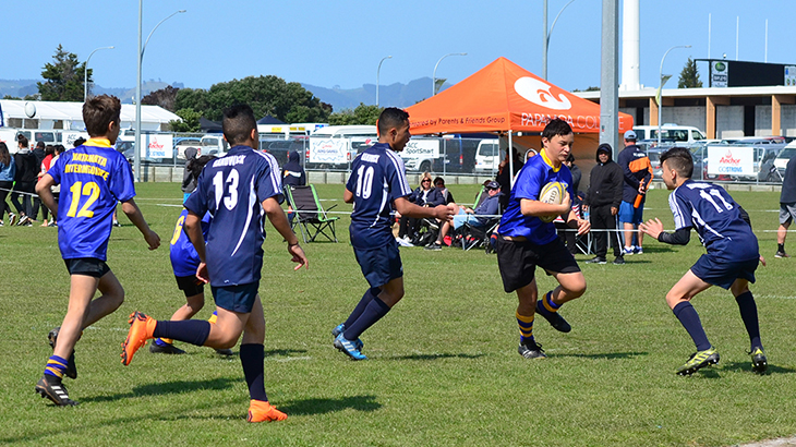 Group of boys playing rugby