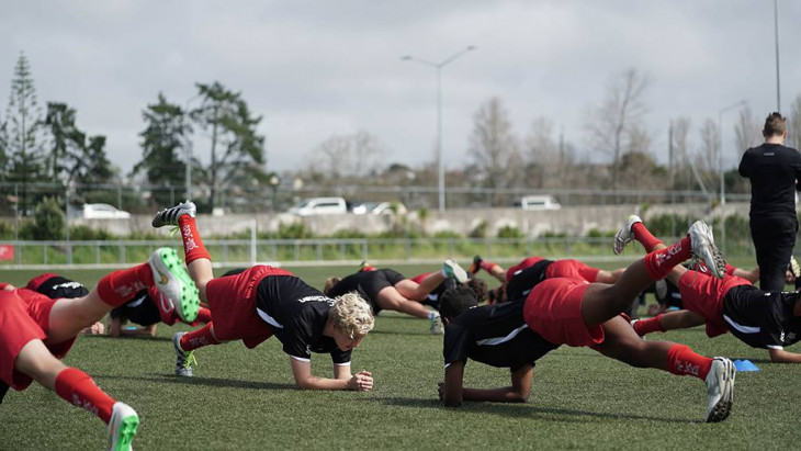 Kids warming up for football