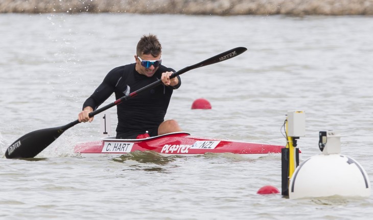 Corbin Hart paddles fiercely in his kayak