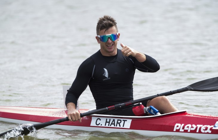 Corbin Hart give a thumbs-up in his kayak