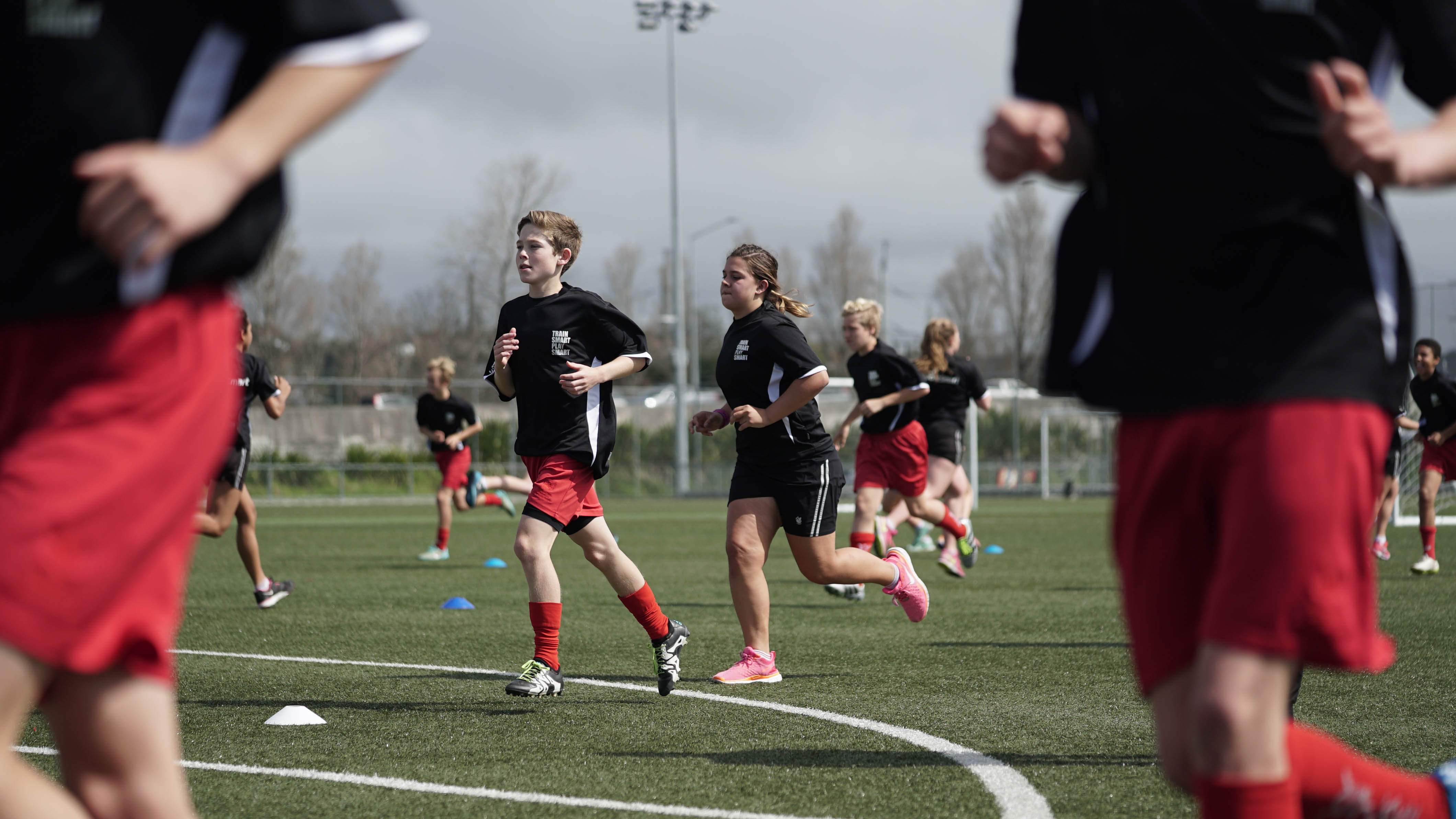 Kids exercising at training