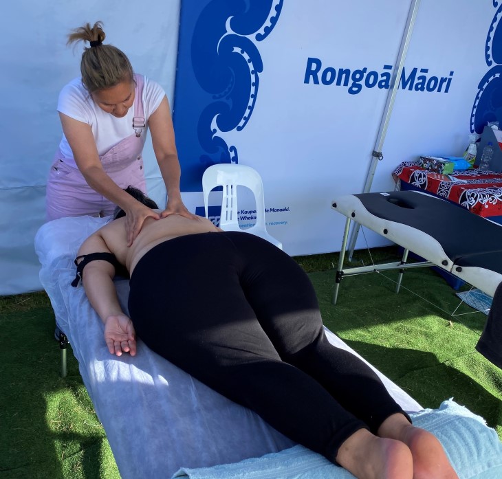 Rongoā Māori practitioner Teena Te Maro using her healing methods on a female patient.