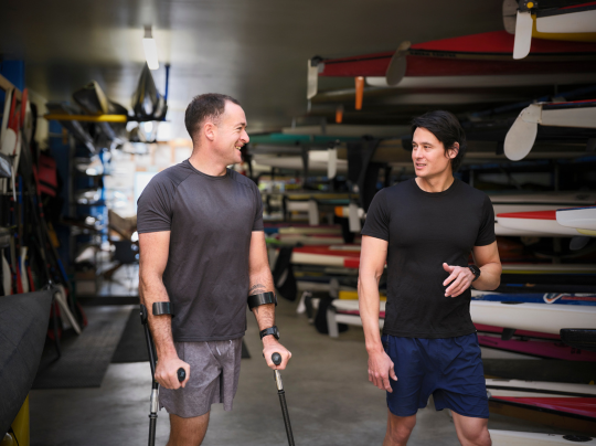Rehabilitation session with two men talking