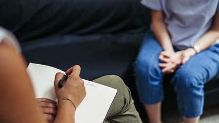 Patient and provider filling out form