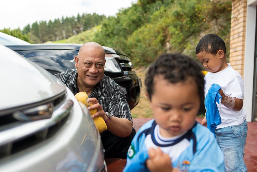 Family washing car