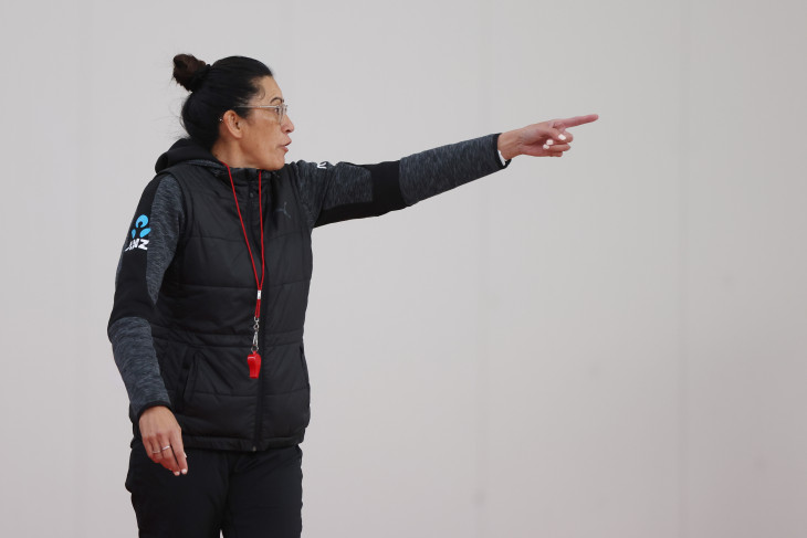 Noeline Taurua on the side of the netball court instructing her players.