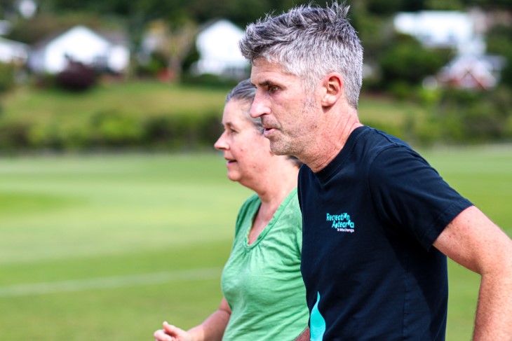 Andrew runs with his sister