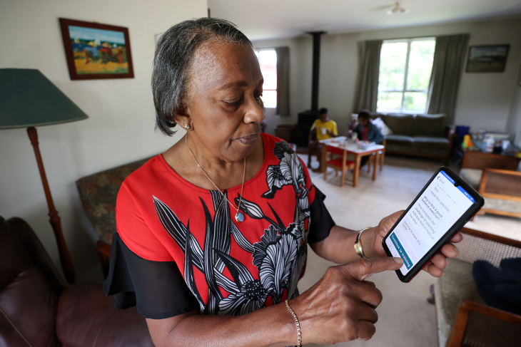 Dorothy Fitzpatrick using the Nymbl app on her phone. 