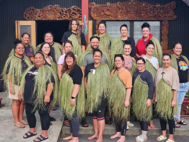 The ACC kaimahi (employees) who attended the Pinepine te Kura wānanga standing next to each other fo