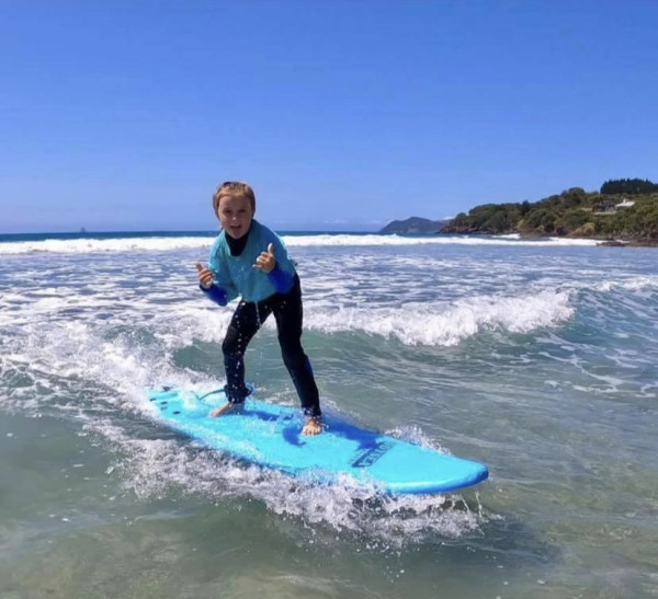 Boy on surfboard