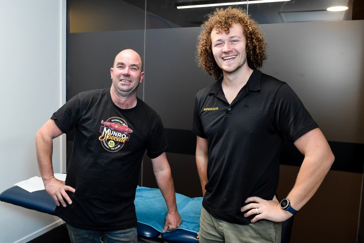 Adrian Reid with his physio Cameron James. 