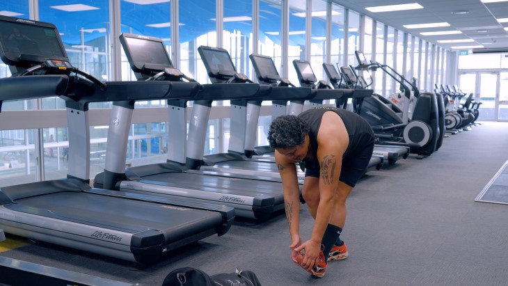 Aroha Te Wao stretching before working out. 