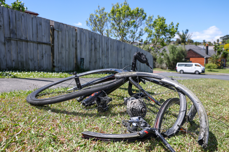 A close-up photo showing Borynt Em Ream's broken bike.