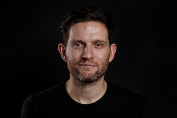 A close-up portrait photo of Dan Buckingham.