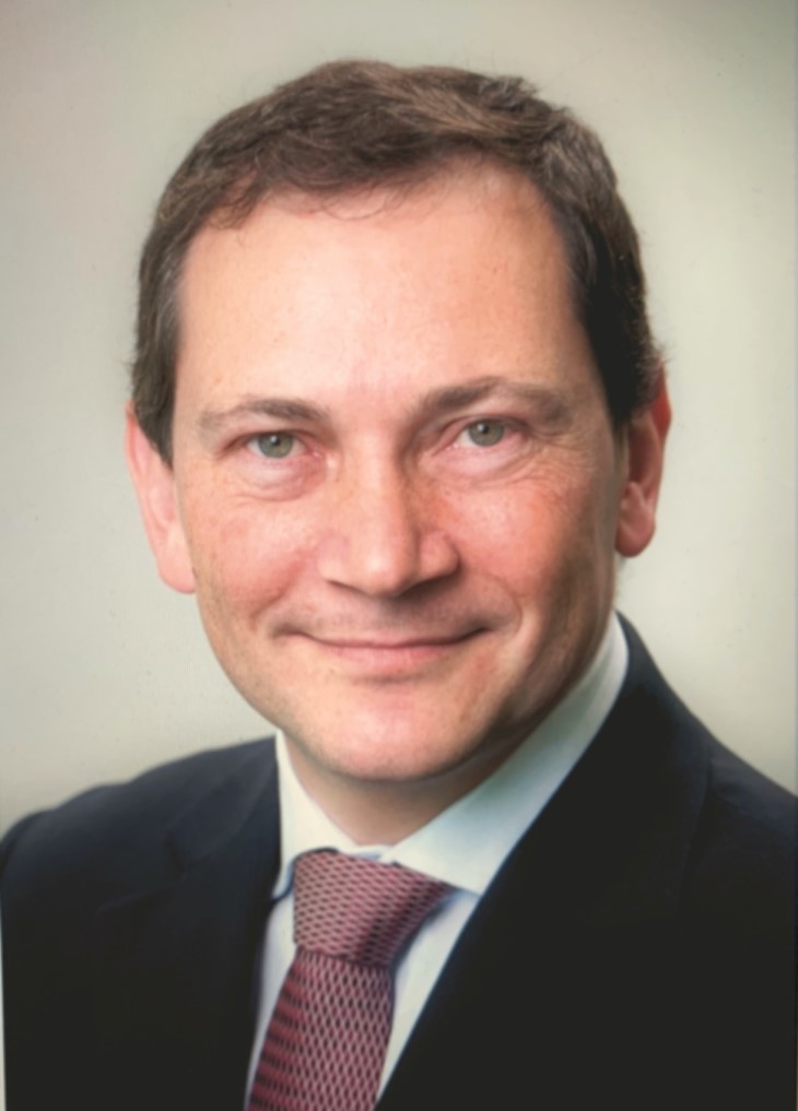 A portrait photo of David Iverson.