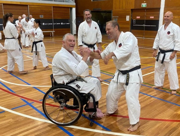 John Marrable teaching karate during a training session.