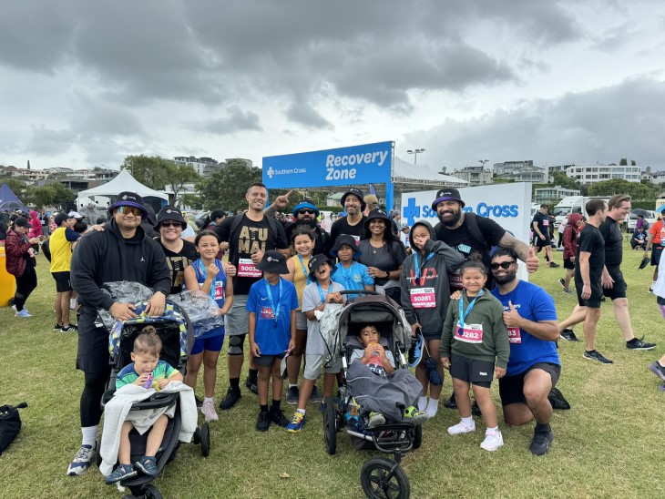 Le Va staff with their friends and family at Round the Bays. 