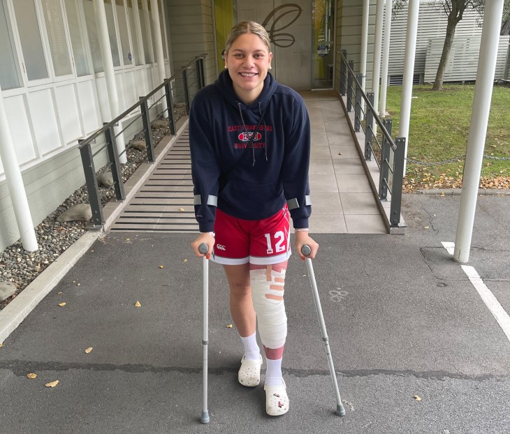 Paris Lokotui on crutches after her knee surgery. 