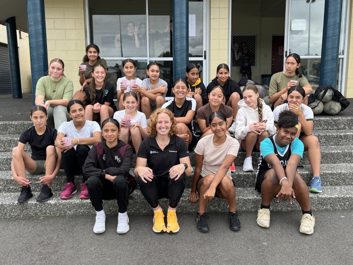 sam winders 1 NetballSmart development officer Sam Winders with a group of school children.