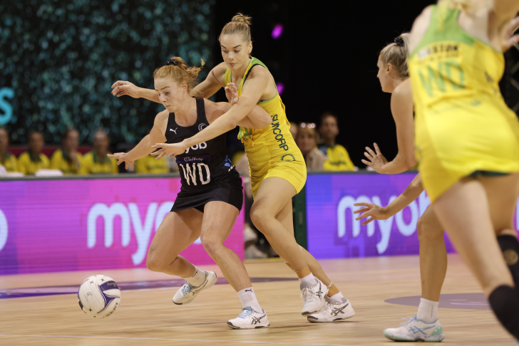 Sam Winders competing for the ball for the Silver Ferns against Australia.