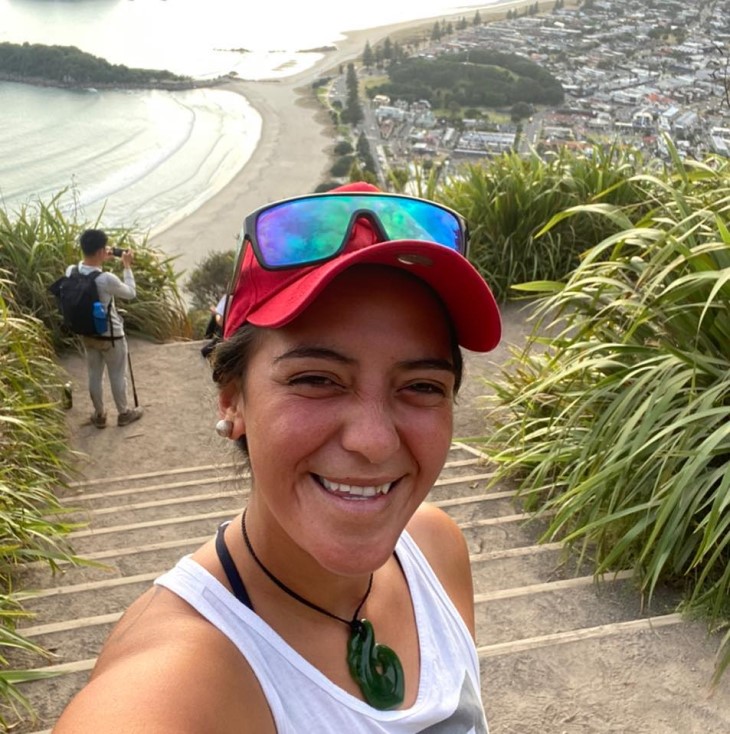 A smiling selfie of Te Rina Ruru-Pelasio on the top of Mount Maunganui. 