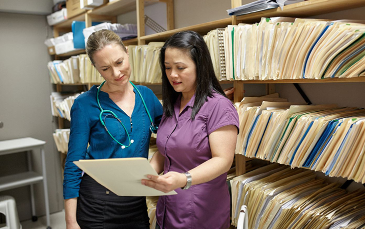 Two medical professionals talking